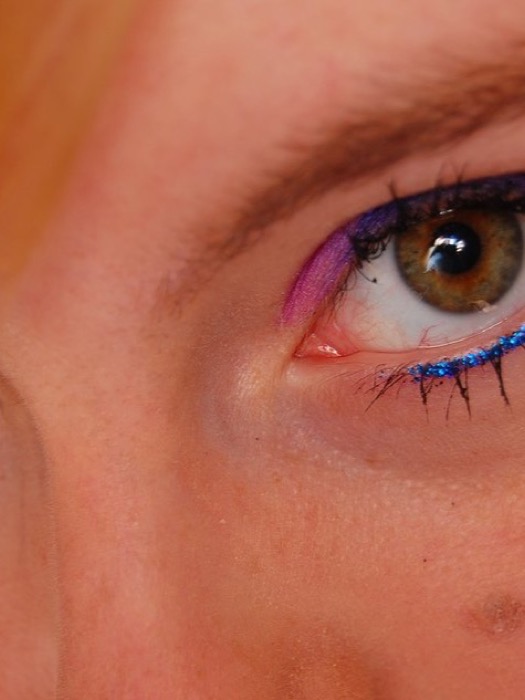Close-up of an eye with brow and lash makeup