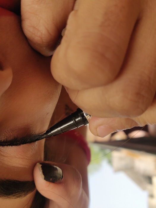 Close-up of eyeliner being applied